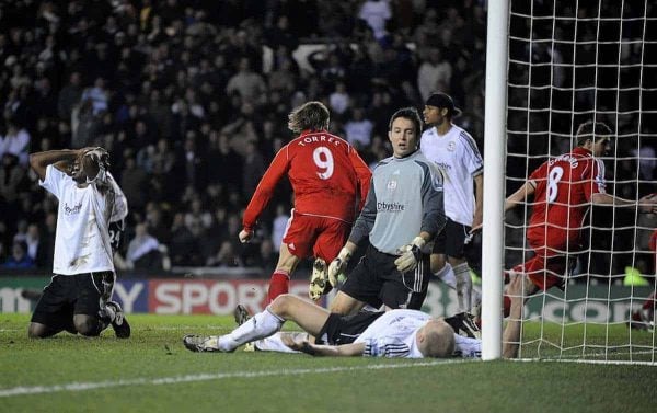 Liverpool's Steven Gerrard scores the winning goal of the game as Derby County players sit dejected