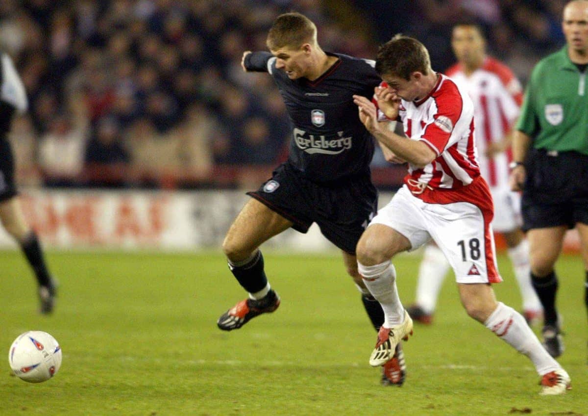 Sheffield United's Michael Tonge and Liverpool's Steven Gerrard battle for the ball