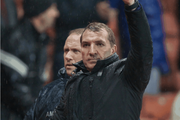 STOKE-ON-TRENT, ENGLAND - Sunday, January 12, 2014: Liverpool's manager Brendan Rodgers applauds the travelling supporters after his side's 5-3 victory over Stoke City during the Premiership match at the Britannia Stadium. (Pic by David Rawcliffe/Propaganda)