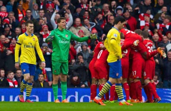 LIVERPOOL, ENGLAND - Saturday, February 8, 2014: Arsenal's goalkeeper Wojciech Szczesny looks dejected as Liverpool score the fourth goal against Arsenal during the Premiership match at Anfield. (Pic by David Rawcliffe/Propaganda)