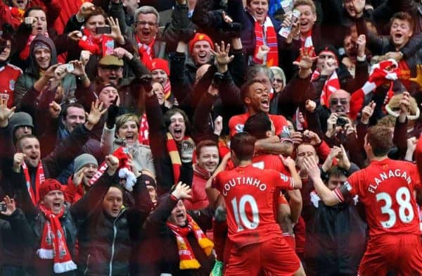 LIVERPOOL, ENGLAND - Saturday, February 8, 2014: Liverpool's Raheem Sterling celebrates scoring the third goal against Arsenal during the Premiership match at Anfield. (Pic by David Rawcliffe/Propaganda)