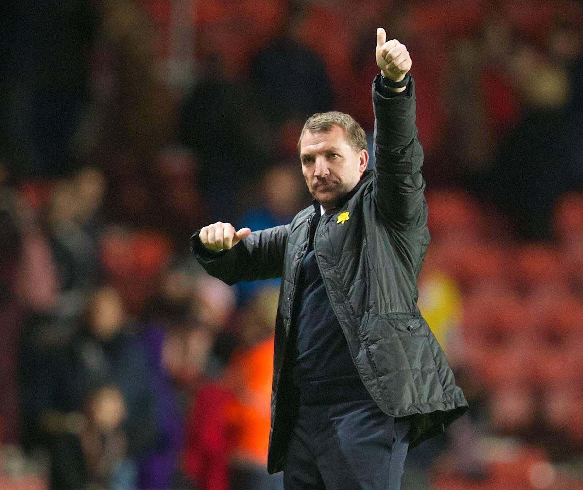 SOUTHAMPTON, ENGLAND - Saturday, March 1, 2014: Liverpool's manager Brendan Rodgers salutes the travelling supporters as his side beat Southampton 3-0 during the Premiership match at St Mary's Stadium. (Pic by David Rawcliffe/Propaganda)