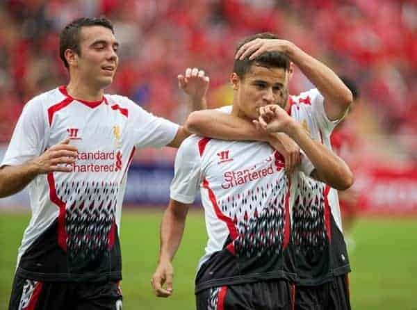 BANGKOK, THAILAND - Sunday, July 28, 2013: Liverpool's Philippe Coutinho Correia celebrates scoring the first goal against Thailand XI during a preseason friendly match at the Rajamangala National Stadium. (Pic by David Rawcliffe/Propaganda)