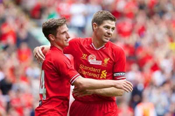 LIVERPOOL, ENGLAND - Saturday, August 3, 2013: Liverpool's Joe Allen celebrates scoring the first goal against Olympiakos CFP with team-mate captain Steven Gerrard during a preseason friendly match at Anfield. (Pic by David Rawcliffe/Propaganda)