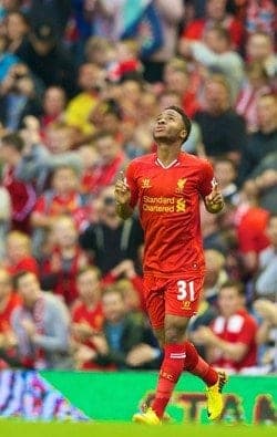 LIVERPOOL, ENGLAND - Tuesday, August 27, 2013: Liverpool's Raheem Sterling celebrates scoring the first goal against Notts County during the Football League Cup 2nd Round match at Anfield. (Pic by David Rawcliffe/Propaganda)