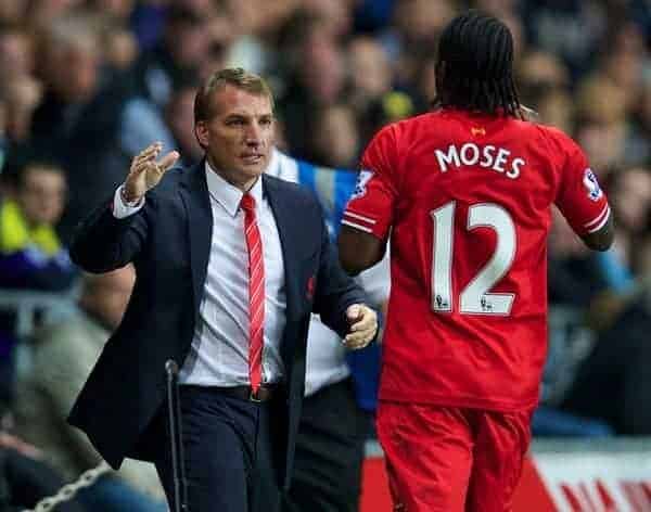 SWANSEA, WALES - Monday, September 16, 2013: Liverpool's Victor Moses celebrates scoring the second goal against Swansea City, on his debut, with manager Brendan Rodgers during the Premiership match at the Liberty Stadium. (Pic by David Rawcliffe/Propaganda)
