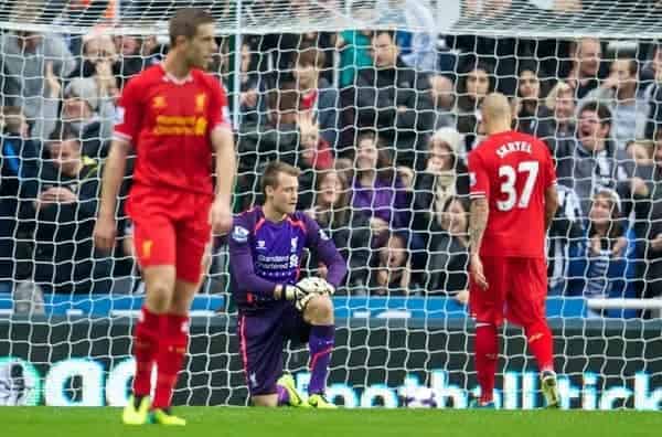 NEWCASTLE-UPON-TYNE, ENGLAND - Saturday, October 19, 2013: Liverpool's goalkeeper Simon Mignolet looks dejected as Newcastle United score the opening goal during the Premiership match at St. James' Park. (Pic by David Rawcliffe/Propaganda)