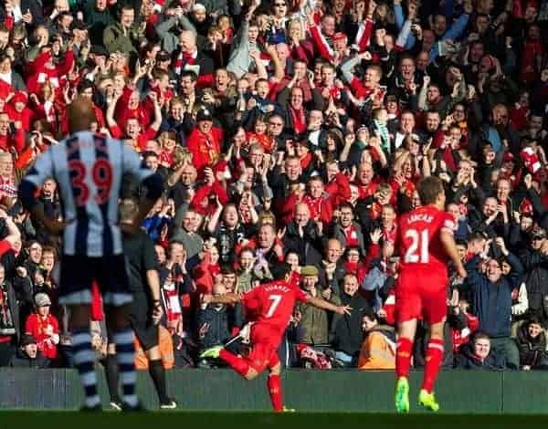 LIVERPOOL, ENGLAND - Saturday, October 26, 2013: Liverpool's Luis Suarez celebrates scoring the first goal against West Bromwich Albion during the Premiership match at Anfield. (Pic by David Rawcliffe/Propaganda)