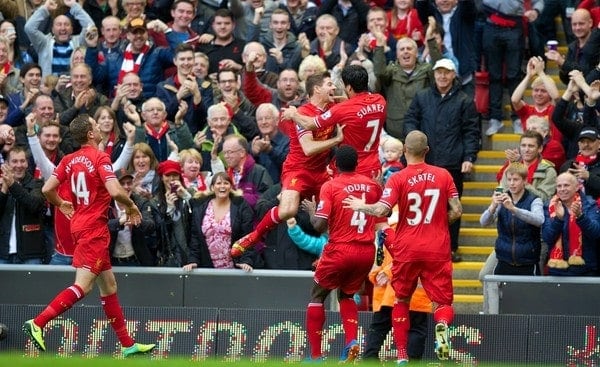 LIVERPOOL, ENGLAND - Saturday, October 26, 2013: Liverpool's hat-trick hero Luis Suarez celebrates scoring the third goal against West Bromwich Albion, to complete his hat-trick, with team-mate captain Steven Gerrard during the Premiership match at Anfield. (Pic by David Rawcliffe/Propaganda)