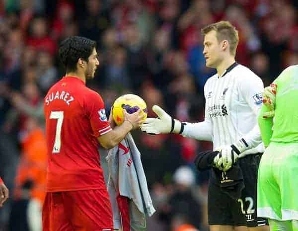 Liverpool FC Wears T-Shirts Supporting Luis Suarez During Pregame Warm-Ups  