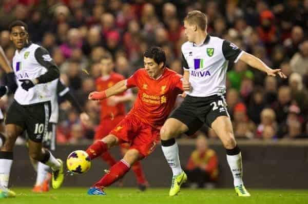 LIVERPOOL, ENGLAND - Wednesday, December 4, 2013: Liverpool's Luis Suarez scores the third goal against Norwich City during the Premiership match at Anfield. (Pic by David Rawcliffe/Propaganda)