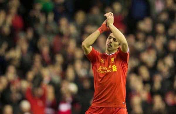 LIVERPOOL, ENGLAND - Wednesday, December 4, 2013: Liverpool's Luis Suarez gets a standing ovation from the supporters after his four goals helped seal a 5-1 victory against Norwich City during the Premiership match at Anfield. (Pic by David Rawcliffe/Propaganda)