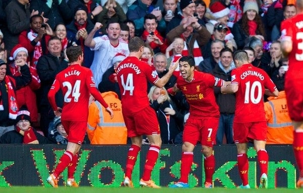 LIVERPOOL, ENGLAND - Saturday, December 21, 2013: Liverpool's Luis Suarez celebrates scoring the first goal against Cardiff City during the Premiership match at Anfield. (Pic by David Rawcliffe/Propaganda)