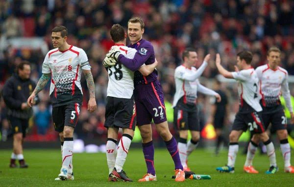 MANCHESTER, ENGLAND - Sunday, March 16, 2014: Liverpool's goalkeeper Simon Mignolet celebrates after a 3-0 victory over Manchester United during the Premiership match at Old Trafford. (Pic by David Rawcliffe/Propaganda)