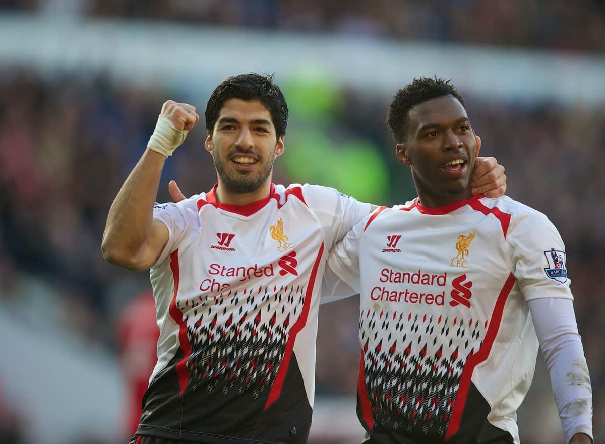 CARDIFF, WALES - Saturday, March 22, 2014: Liverpool's Daniel Sturridge celebrates scoring the fith goal against Cardiff City with team-mate Luis Suarez during the Premiership match at the Cardiff City Stadium. (Pic by David Rawcliffe/Propaganda)