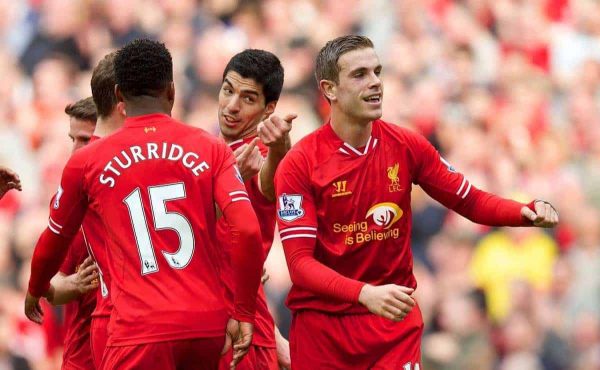 LIVERPOOL, ENGLAND - Sunday, March 30, 2014: It was his idea... Liverpool's Luis Suarez celebrates scoring the fourth goal against Tottenham Hotspur after a free-kick from Jordan Henderson during the Premiership match at Anfield. (Pic by David Rawcliffe/Propaganda)