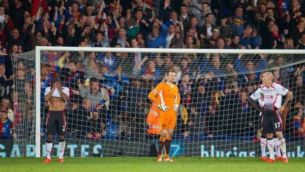 LONDON, ENGLAND - Monday, May 5, 2014: Liverpool's goalkeeper Simon Mignolet along with Glen Johnson and Martin Skrtel look dejected as Crystal Palace score the third goal during the Premiership match at Selhurst Park. (Pic by David Rawcliffe/Propaganda)