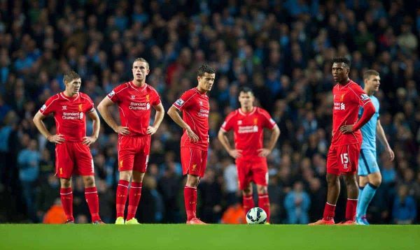 MANCHESTER, ENGLAND - Monday, August 25, 2014: Liverpool's captain Steven Gerrard, Jordan Henderson, Philippe Coutinho Correia and Daniel Sturridge look dejected as Manchester City score the opening goal during the Premier League match at the City of Manchester Stadium. (Pic by David Rawcliffe/Propaganda)