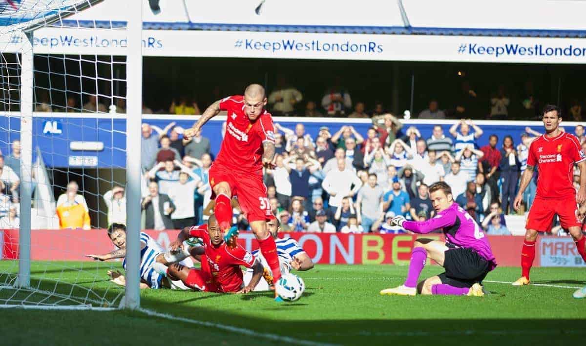 LONDON, ENGLAND - Sunday, October 19, 2014: Liverpool's Martin Skrtel clears the ball off the line against Queens Park Rangers during the Premier League match at Loftus Road. (Pic by David Rawcliffe/Propaganda)