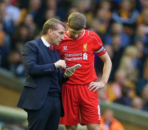 LIVERPOOL, ENGLAND - Saturday, October 25, 2014: Liverpool's manager Brendan Rodgers gives instructions to captain Steven Gerrard against Hull City during the Premier League match at Anfield. (Pic by David Rawcliffe/Propaganda)
