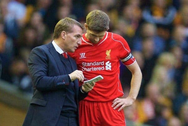 LIVERPOOL, ENGLAND - Saturday, October 25, 2014: Liverpool's manager Brendan Rodgers gives instructions to captain Steven Gerrard against Hull City during the Premier League match at Anfield. (Pic by David Rawcliffe/Propaganda)