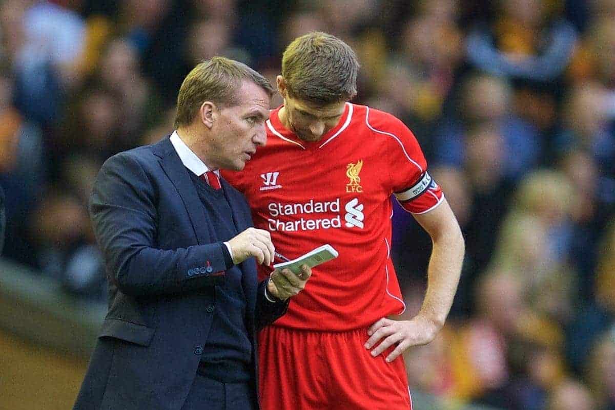 LIVERPOOL, ENGLAND - Saturday, October 25, 2014: Liverpool's manager Brendan Rodgers gives instructions to captain Steven Gerrard against Hull City during the Premier League match at Anfield. (Pic by David Rawcliffe/Propaganda)