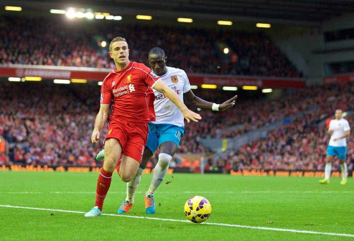 LIVERPOOL, ENGLAND - Saturday, October 25, 2014: Liverpool's Jordan Henderson is fouled by Hull City's Mohamed Diame, but instead of penalty the referee showed a yellow card to the Liverpool player, during the Premier League match at Anfield. (Pic by David Rawcliffe/Propaganda)