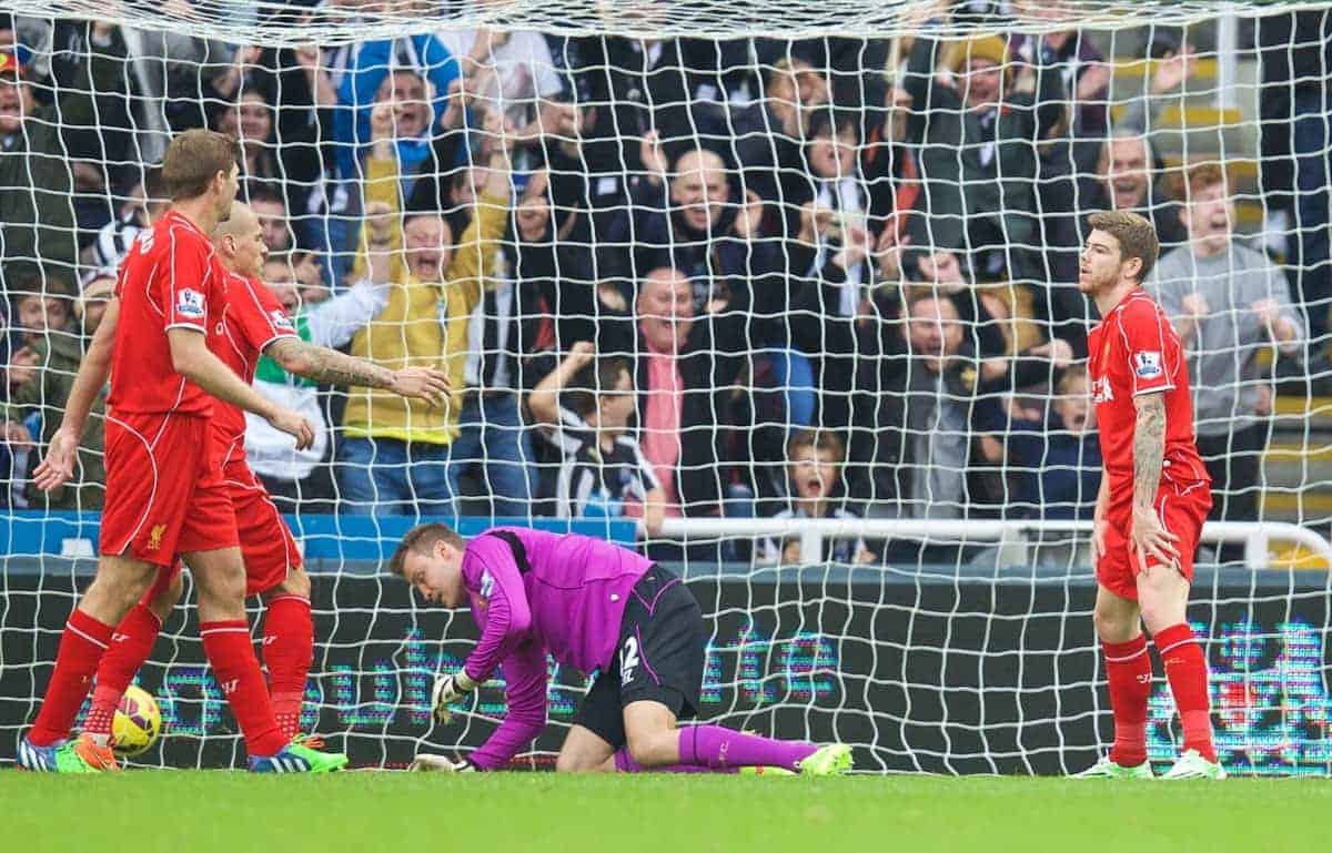 NEWCASTLE-UPON-TYNE, ENGLAND - Saturday, November 1, 2014: Liverpool's goalkeeper Simon Mignolet and Alberto Moreno look dejected as Newcastle United score the first goal during the Premier League match at St. James' Park. (Pic by David Rawcliffe/Propaganda)