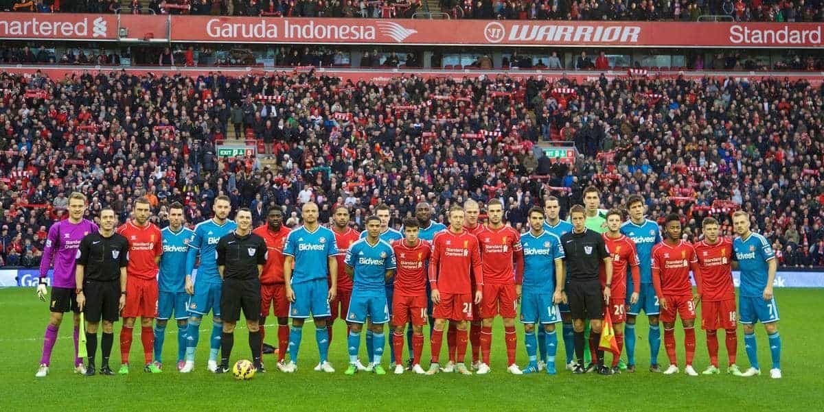 LIVERPOOL, ENGLAND - Saturday, December 6, 2014: Liverpool and Sunderland players stand together for Football Remembers during the Premier League match at Anfield. (Pic by David Rawcliffe/Propaganda)