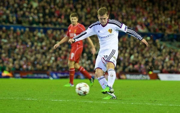 LIVERPOOL, ENGLAND - Tuesday, December 9, 2014: FC Basel's Fabian Frei scores the first goal against Liverpool during the final UEFA Champions League Group B match at Anfield. (Pic by David Rawcliffe/Propaganda)