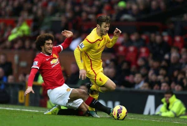 MANCHESTER, ENGLAND - Sunday, December 14, 2014: Liverpool's Adam Lallana is fouled by Manchester United's Guillermo Varela during the Premier League match at Old Trafford. (Pic by David Rawcliffe/Propaganda)