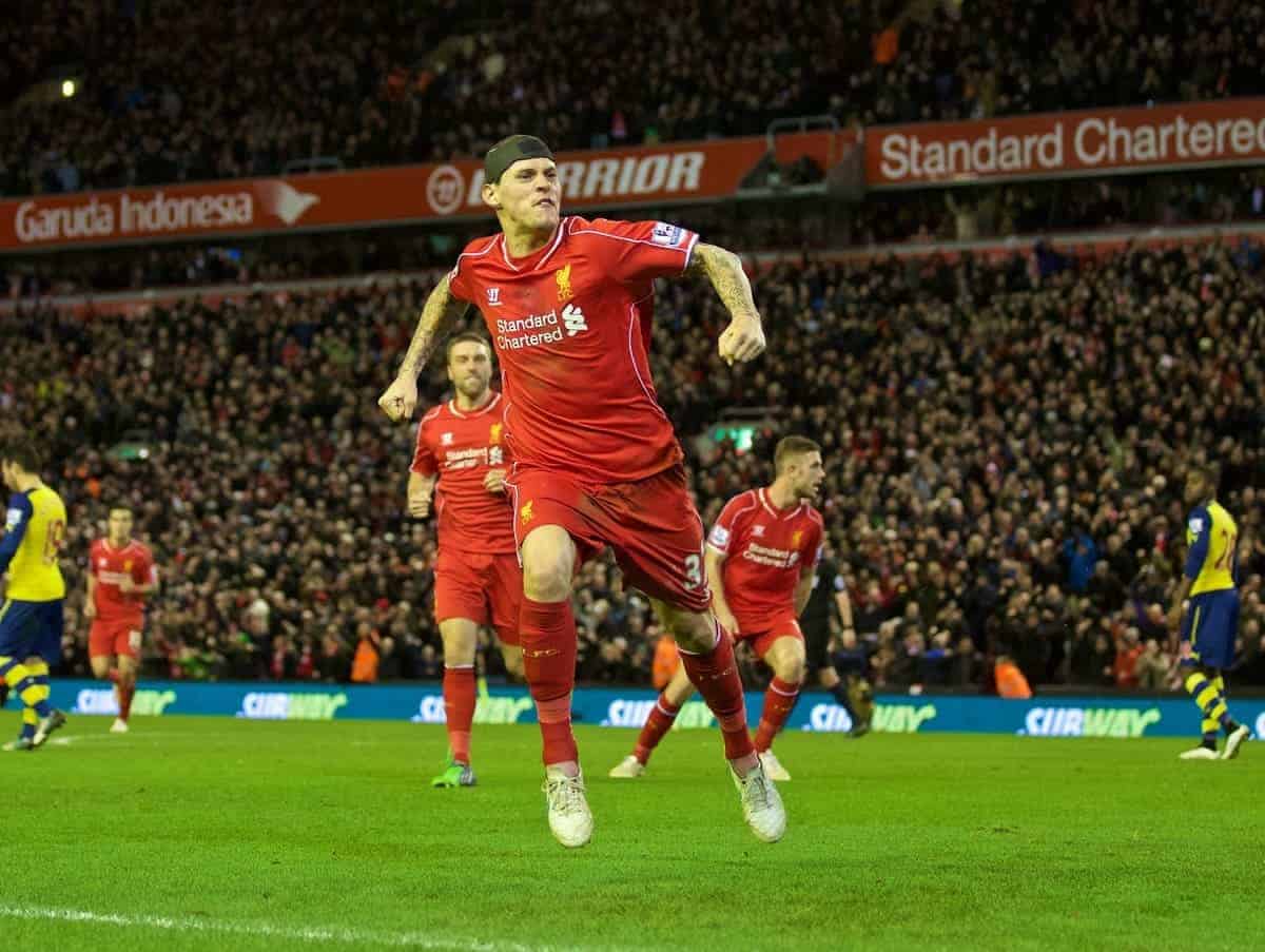 LIVERPOOL, ENGLAND - Sunday, December 21, 2014: Liverpool's Martin Skrtel celebrates scoring the second goal against Arsenal during the Premier League match at Anfield. (Pic by David Rawcliffe/Propaganda)