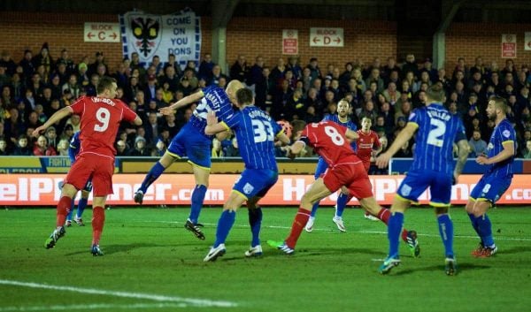 KINGSTON-UPON-THAMES, ENGLAND - Monday, January 5, 2015: Liverpool's captain Steven Gerrard scores the first goal against AFC Wimbledon during the FA Cup 3rd Round match at the Kingsmeadow Stadium. (Pic by David Rawcliffe/Propaganda)