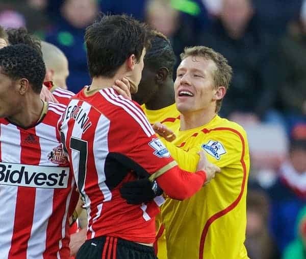 SUNDERLAND, ENGLAND - Saturday, January 10, 2015: Liverpool's Lucas Leiva clashes with Sunderland's Santiago Vergini during the Premier League match at the Stadium of Light. (Pic by David Rawcliffe/Propaganda)