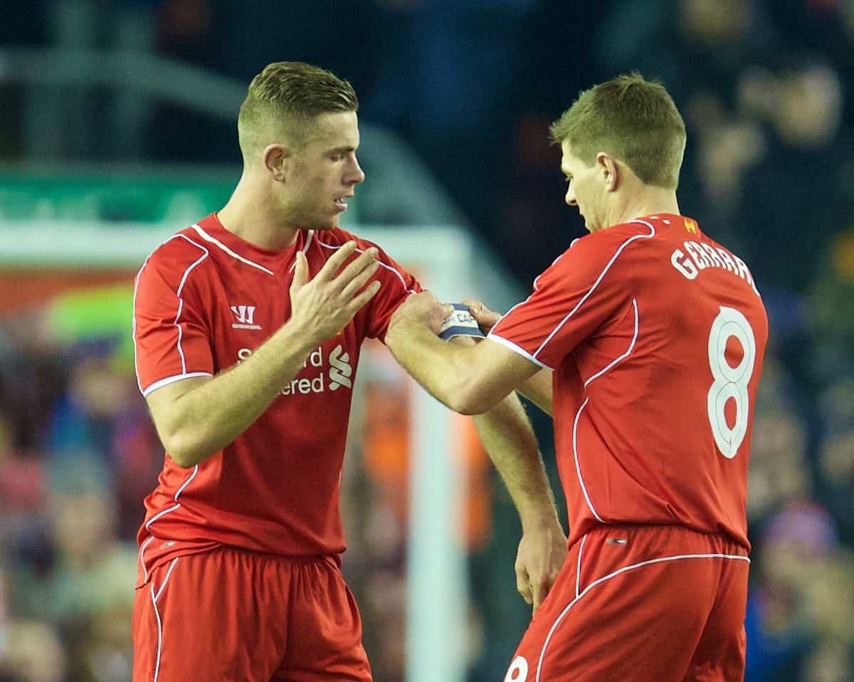 LIVERPOOL, ENGLAND - Tuesday, January 20, 2015: Liverpool's captain Steven Gerrard hands the armband to Jordan Henderson as he is substituted against Chelsea during the Football League Cup Semi-Final 1st Leg match at Anfield. (Pic by David Rawcliffe/Propaganda)