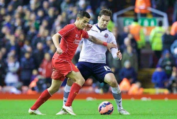 LIVERPOOL, ENGLAND - Saturday, January 24, 2015: Liverpool's Philippe Coutinho Correia in action against Bolton Wanderers' Dorian Dervite during the FA Cup 4th Round match at Anfield. (Pic by Lindsey Parnaby/Propaganda)