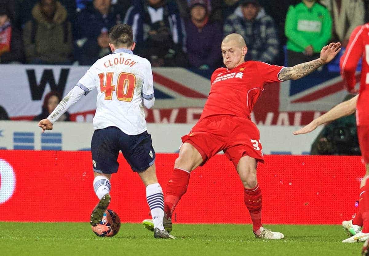 BOLTON, ENGLAND - Wednesday, February 4, 2015: Liverpool's Martin Skrtel brings down Bolton Wanderers' Zach Clough for a penalty during the FA Cup 4th Round Replay match at the Reebok Stadium. (Pic by David Rawcliffe/Propaganda)