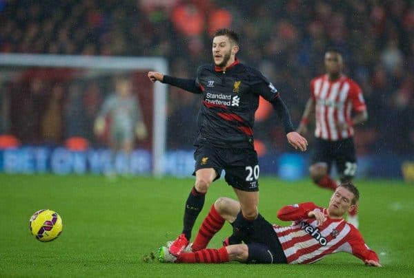 SOUTHAMPTON, ENGLAND - Sunday, February 22, 2015: Liverpool's Adam Lallana in action against Southampton's Matt Targett during the FA Premier League match at St Mary's Stadium. (Pic by David Rawcliffe/Propaganda)