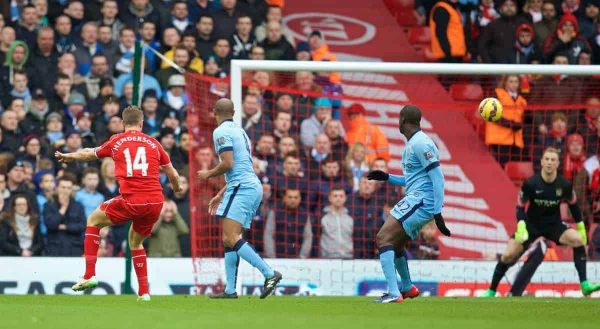 LIVERPOOL, ENGLAND - Sunday, March 1, 2015: Liverpool's captain Jordan Henderson scores the first goal against Manchester City during the Premier League match at Anfield. (Pic by David Rawcliffe/Propaganda)