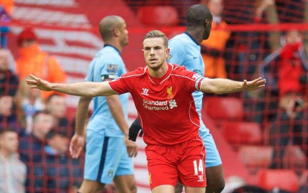 LIVERPOOL, ENGLAND - Sunday, March 1, 2015: Liverpool's captain Jordan Henderson celebrates scoring the first goal against Manchester City during the Premier League match at Anfield. (Pic by David Rawcliffe/Propaganda)