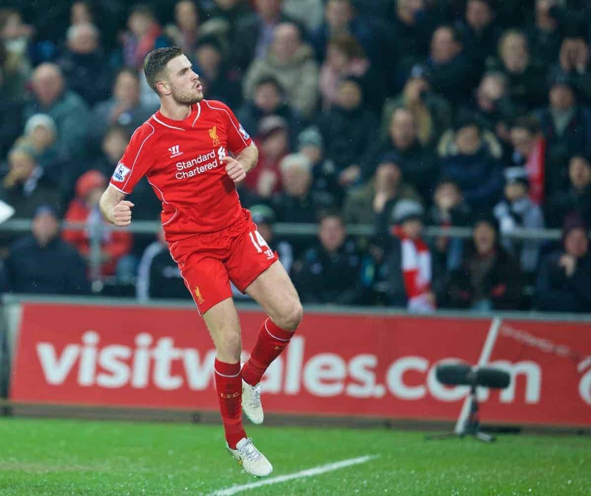 SWANSEA, ENGLAND - Monday, March 16, 2015: Liverpool's captain Jordan Henderson celebrates scoring the first goal against Swansea City during the Premier League match at the Liberty Stadium. (Pic by David Rawcliffe/Propaganda)