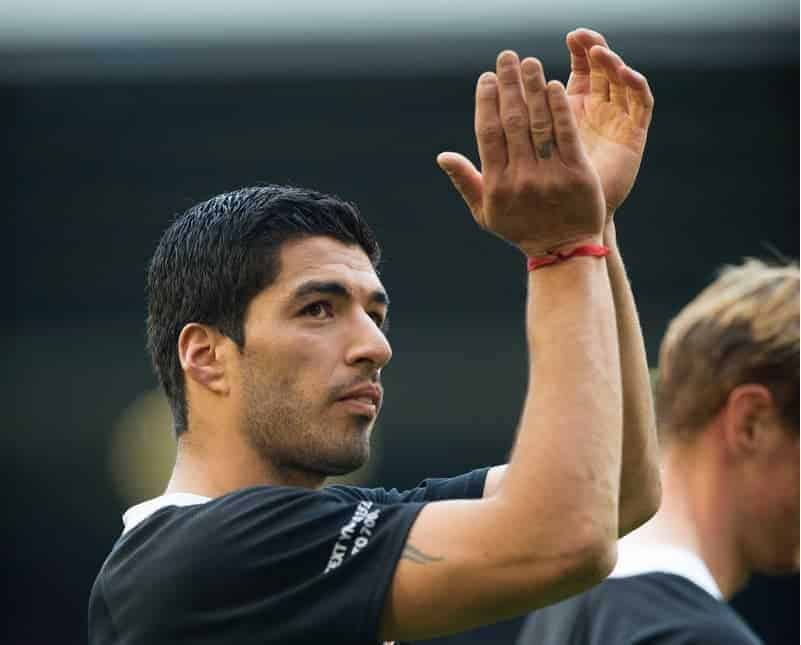 LIVERPOOL, ENGLAND - Sunday, March 29, 2015: Luis Suarez of Liverpool salutes the fans at the end of the Liverpool All Star Charity match at Anfield. (Pic by Richard Martin-Roberts/Propaganda)