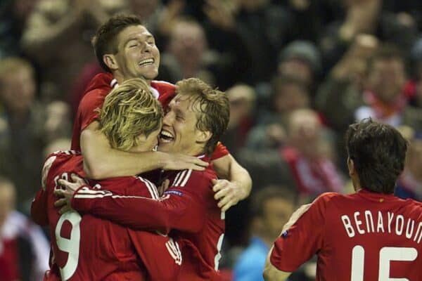 LIVERPOOL, ENGLAND - Thursday, March 18, 2010: Liverpool's Fernando Torres celebrates with captain Steven Gerrard MBE and Lucas Leiva after scoring the third goal, his second, against LOSC Lille Metropole during the UEFA Europa League Round of 16 2nd Leg match at Anfield. (Photo by David Rawcliffe/Propaganda)