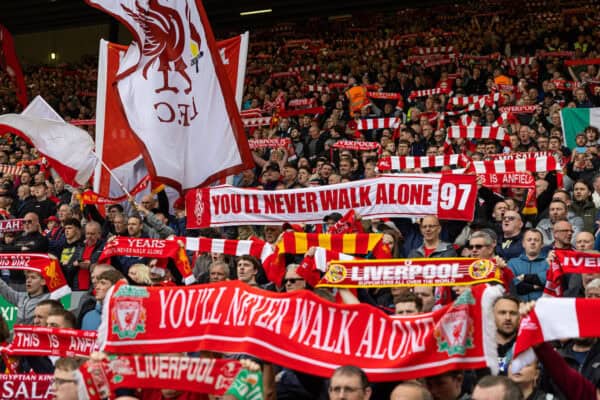 LIVERPOOL, ENGLAND - Saturday, April 22, 2023: Liverpool supporter on the Spion Kop sing "You'll Never Walk Alone" during the FA Premier League match between Liverpool FC and Nottingham Forest FC at Anfield. (Pic by David Rawcliffe/Propaganda)