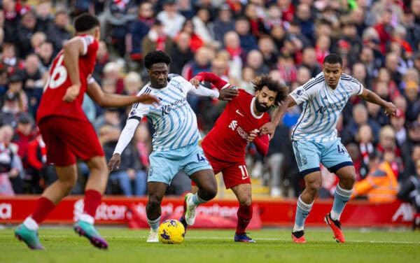 LIVERPOOL, ENGLAND - Sunday, October 29, 2023: Liverpool's Mohamed Salah (C) is challenged by Nottingham Forest's Ola Aina (L) and Murillo Santiago Costa dos Santos (R) during the FA Premier League match between Liverpool FC and Nottingham Forest FC at Anfield. Liverpool won 3-0. (Photo by David Rawcliffe/Propaganda)