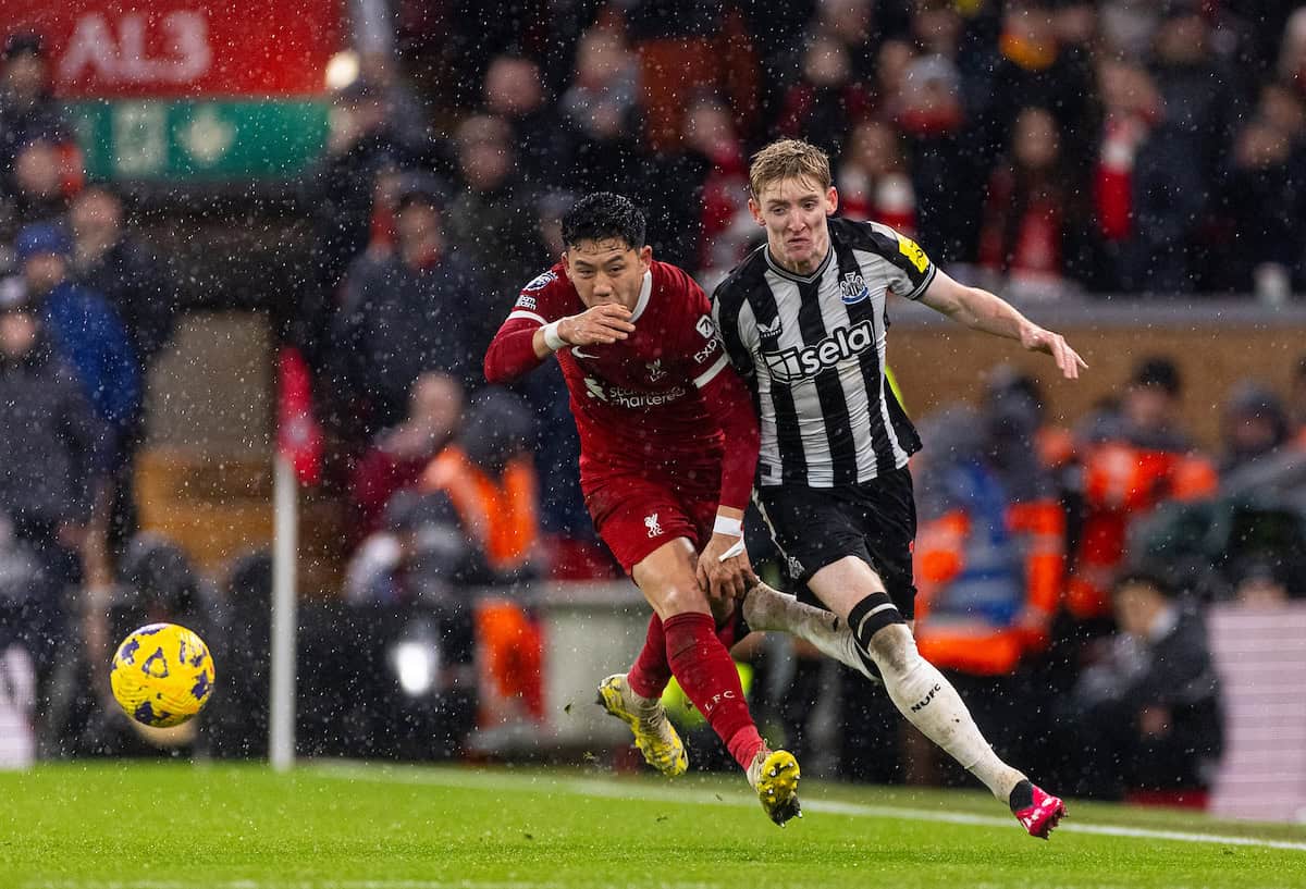 LIVERPOOL, ENGLAND - Monday, January 1, 2024: Newcastle United's Anthony Gordon (R) is challenged by Liverpool's Wataru End? during the FA Premier League match between Liverpool FC and Newcastle United FC on New Year's Day at Anfield. Liverpool won 4-2. (Photo by David Rawcliffe/Propaganda)