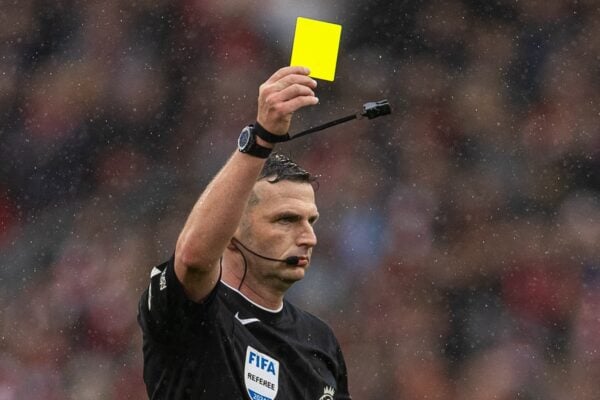 LIVERPOOL, ENGLAND - Sunday, March 10, 2024: Referee Michael Oliver finally issues a yellow card to Manchester City's Rodrigo Hernández Cascante 'Rodri' during the FA Premier League match between Liverpool FC and Manchester City FC at Anfield. The game ended 1-1. (Photo by David Rawcliffe/Propaganda)