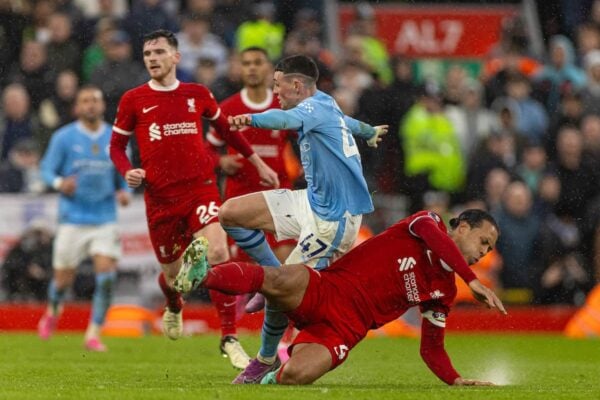 LIVERPOOL, ENGLAND - Sunday, March 10, 2024: Manchester City's Phil Foden (L) is dispossesed by Liverpool's captain Virgil van Dijk during the FA Premier League match between Liverpool FC and Manchester City FC at Anfield. The game ended 1-1. (Photo by David Rawcliffe/Propaganda)