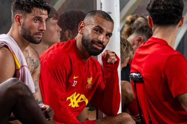 PHILADELPHIA - Wednesday, July 31, 2024: Liverpool's Dominik Szoboszlai (L) and Mohamed Salah on the bench during a pre-season friendly match between Liverpool FC and Arsenal FC at the Lincoln Financial Field on day eight of the club's pre-season tour of the USA. Liverpool won 2-1. (Photo by David Rawcliffe/Propaganda)