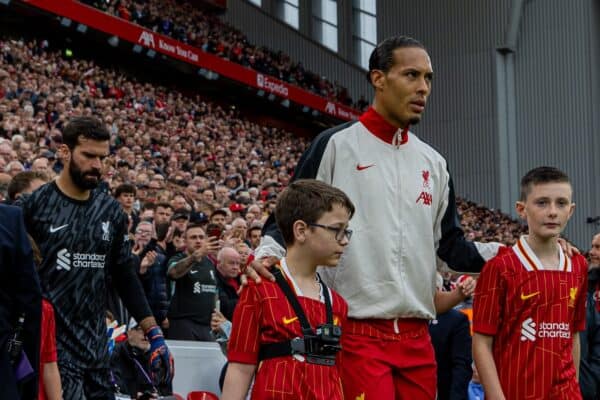 LIVERPOOL, ENGLAND - Sunday, August 25, 2024: Liverpool's captain Virgil van Dijk leads his side out before the FA Premier League match between Liverpool FC and Brentford FC at Anfield. Liverpool won 2-0. (Photo by David Rawcliffe/Propaganda)